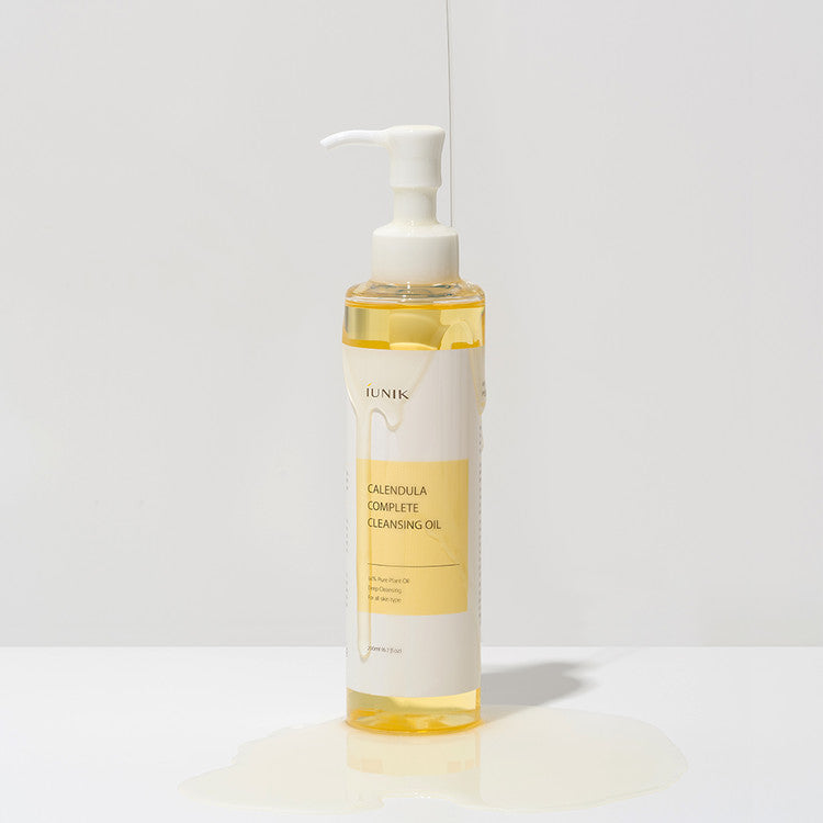 A stylistic image of a bottle of iUNIK Calendula Complete Cleansing oil 200ml