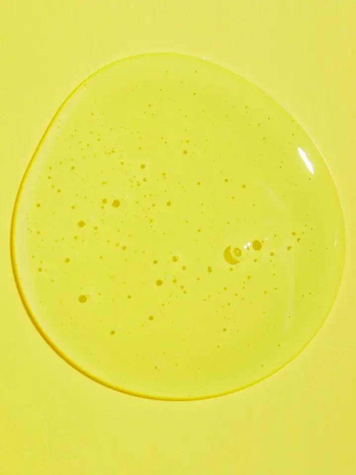 stylistic shot of COSRX Low pH Good Morning Gel Cleanser on yellow paper